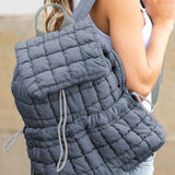 Black Solid Flapped Quilted Puffer Backpack