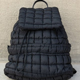 Black Solid Flapped Quilted Puffer Backpack