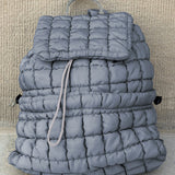 Black Solid Flapped Quilted Puffer Backpack